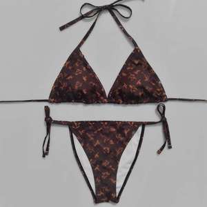 Runway Luxury Style Halter Bikini Set Interlocking Texture Two Piece Swimsuit Gold Chain Detail Resort Beachwear Wholesale